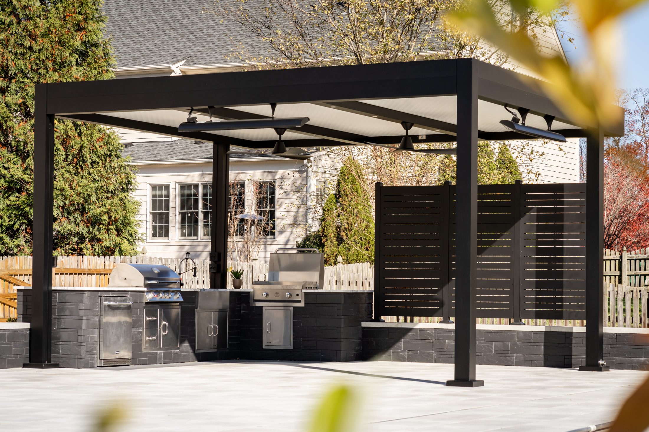 Black frame pergola with premium integrated accessories