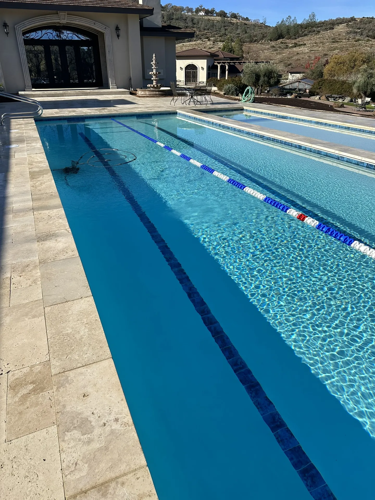 Hillside Lap Pool With Stone Deck