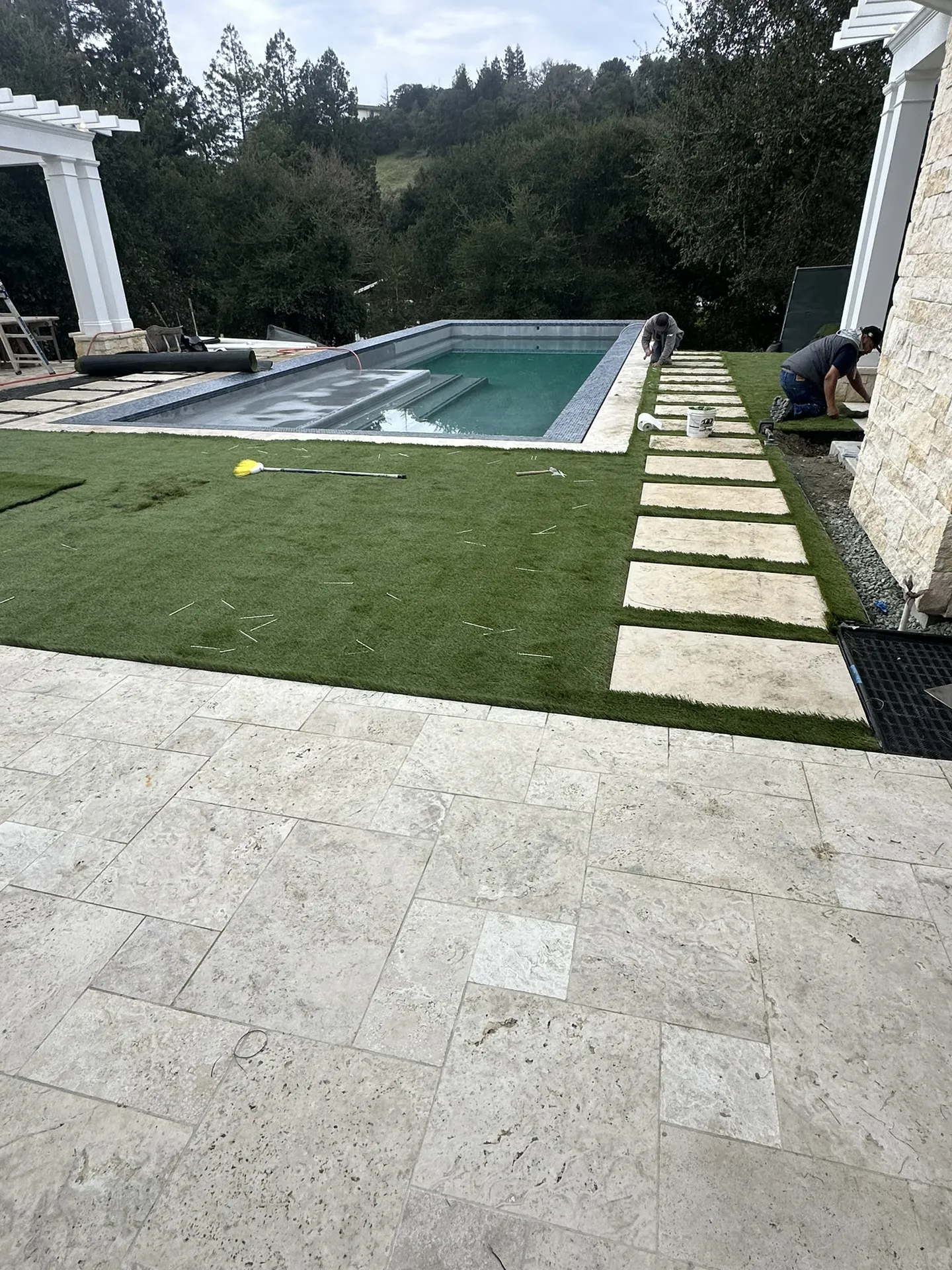 Pergola With Pool and Concrete Patio