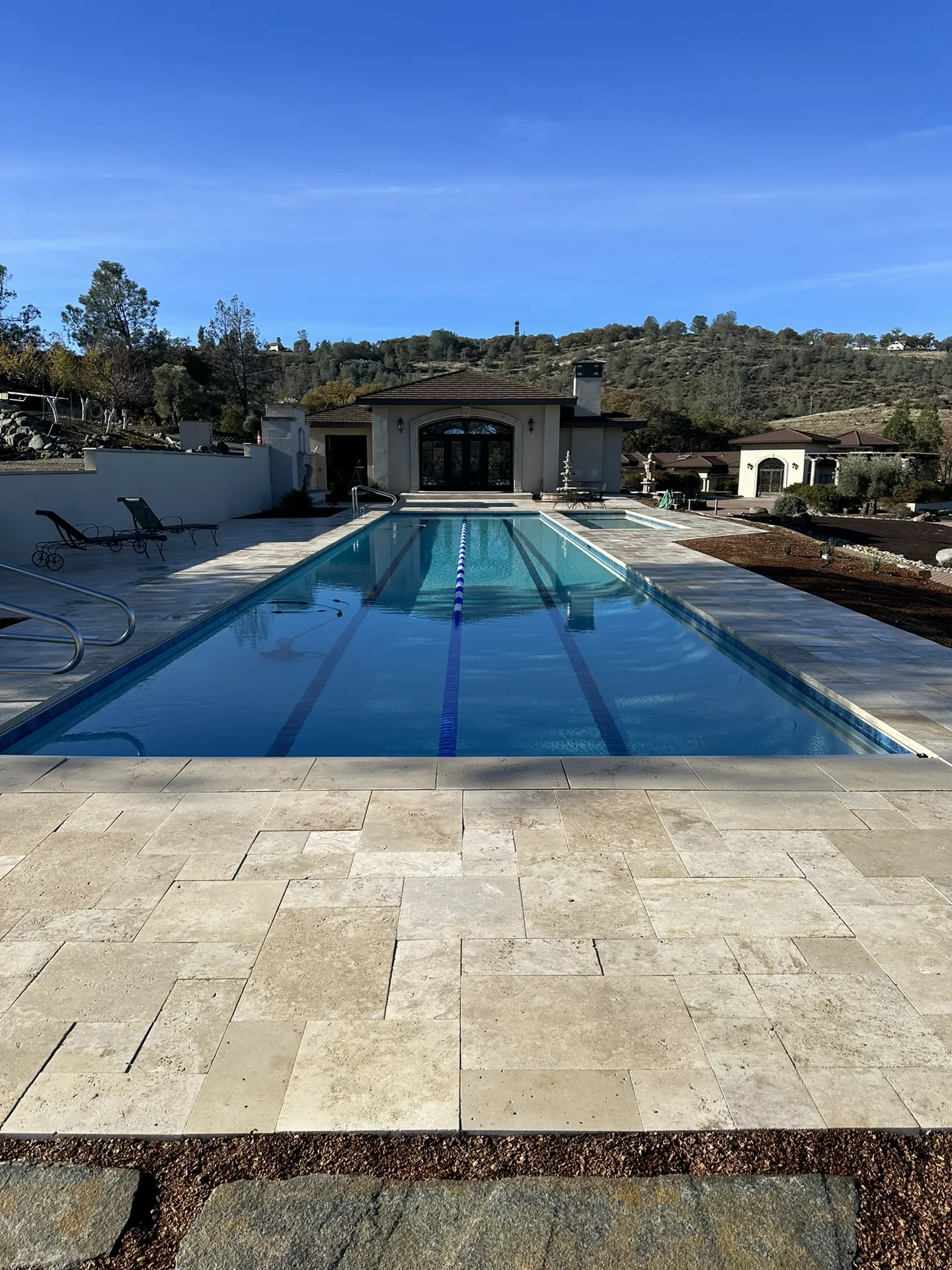 Covered Pool With Stone Hardscape
